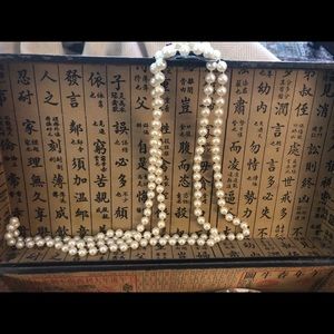 Long costume pearl necklace